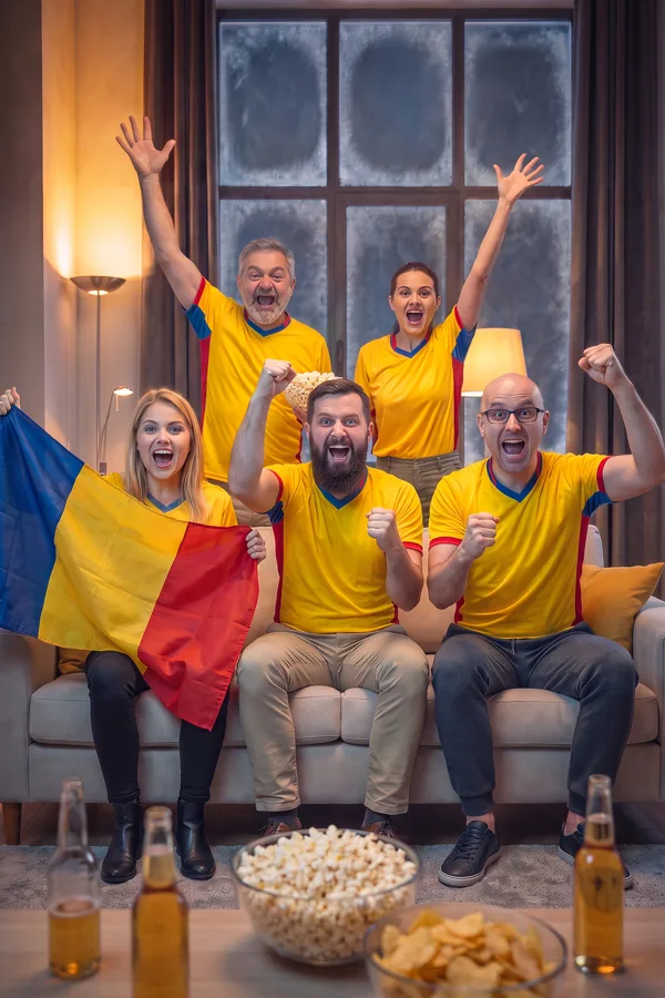 Suporteri care se bucură la un meci